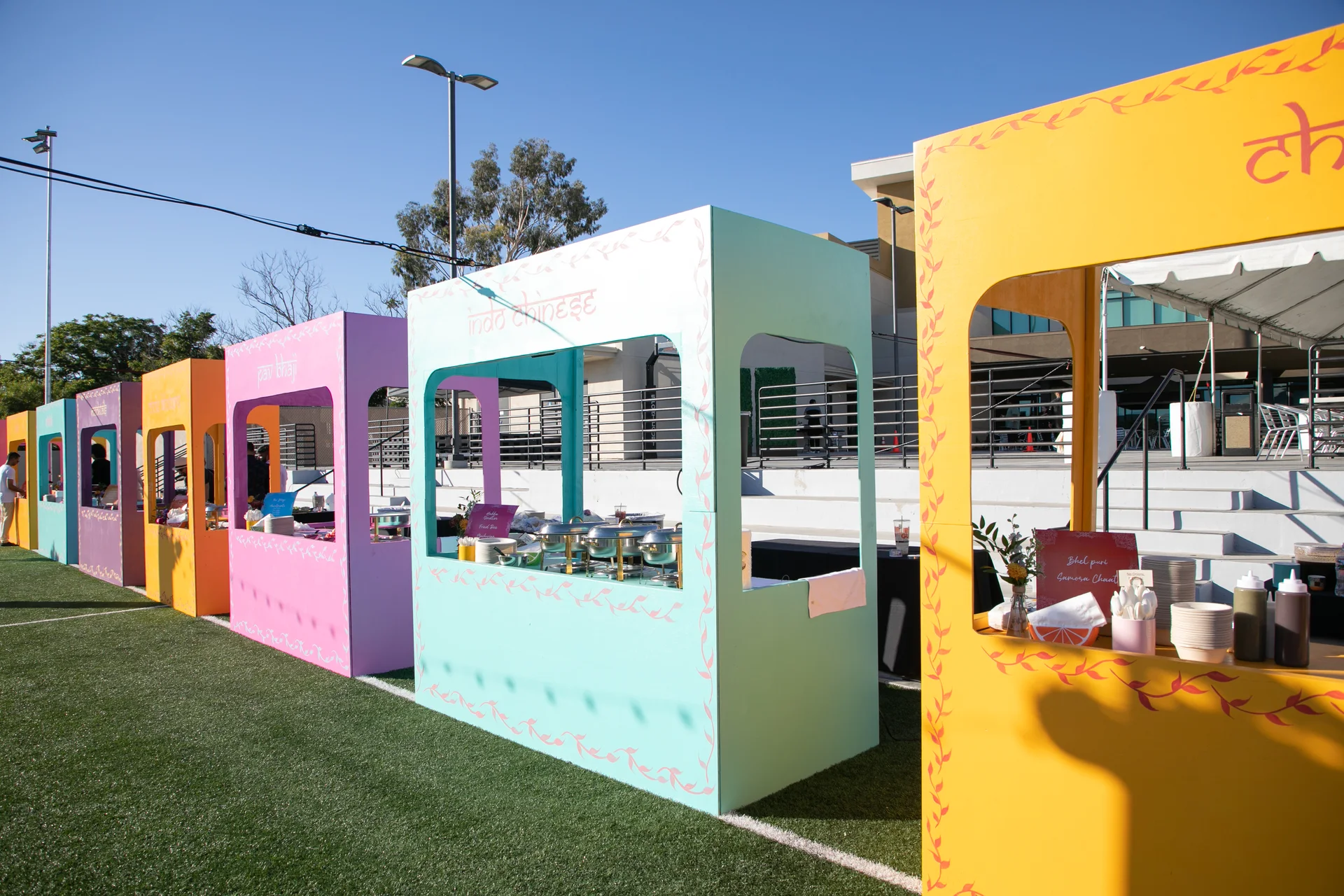 Colorful specialty food stations arranged for Avani and Abhi’s Sangeet.