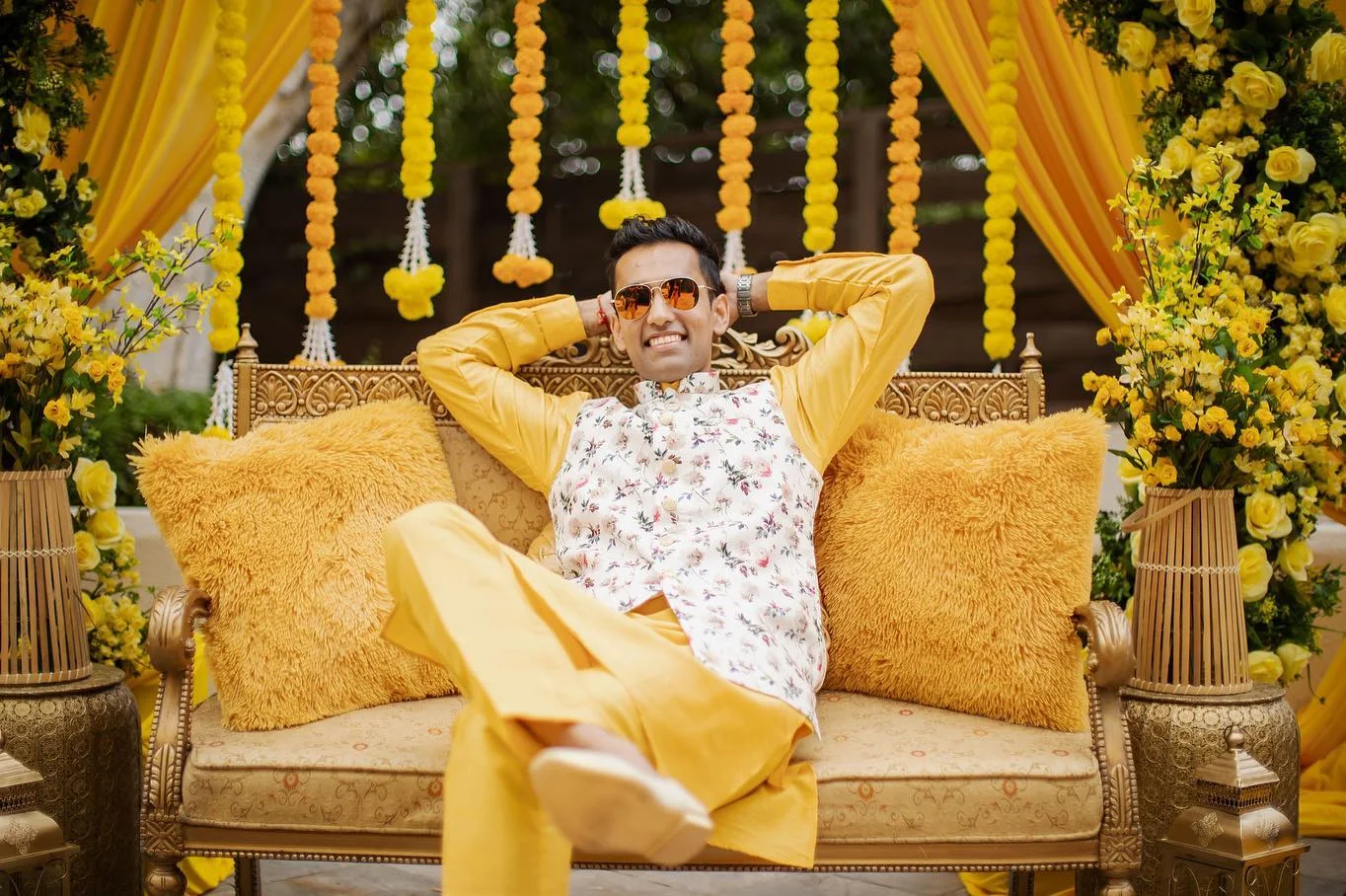 Shray relaxing in the yellow Haldi setting